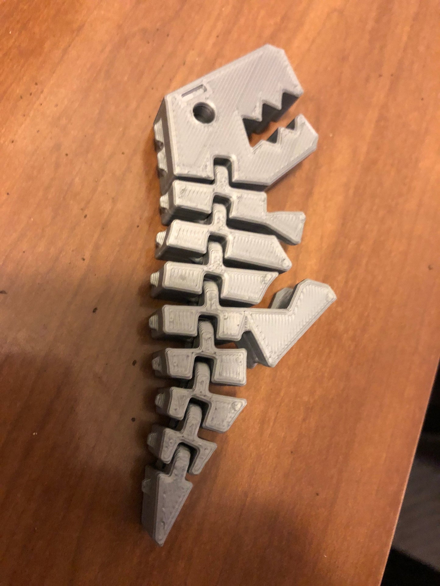 Flexi Rex with stronger links. 3D printed in your color choice. Tyrannosaurus 3D Printed Toy