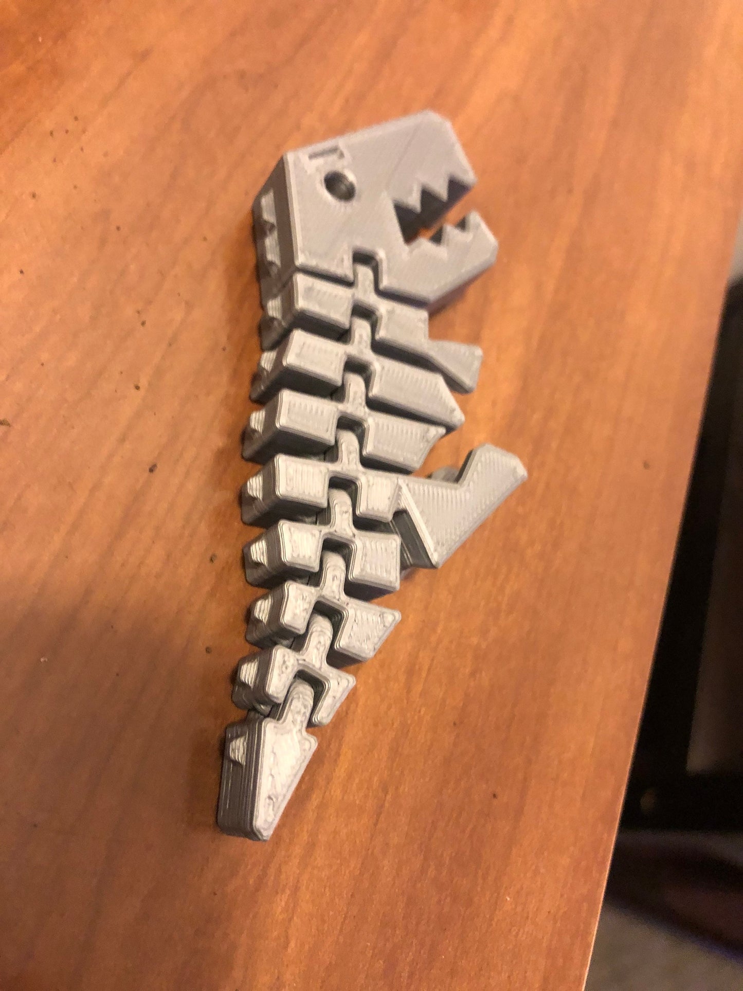 Flexi Rex with stronger links. 3D printed in your color choice. Tyrannosaurus 3D Printed Toy